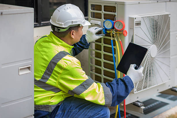Professional Air Conditioning Repair technician working in Oneonta, AL